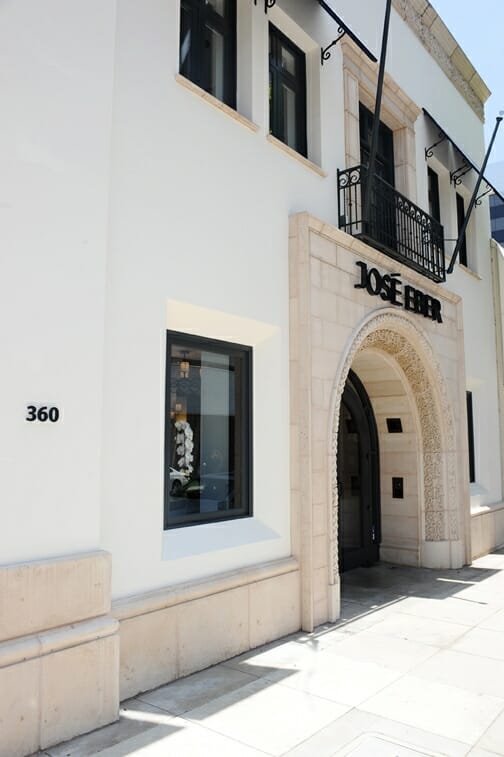 The exterior of the José Eber Salon in Beverly Hills, showcasing its elegant arched entrance and refined architectural design on Canon Drive. The exterior of the José Eber Salon in Beverly Hills, showcasing its elegant arched entrance and refined architectural design on Canon Drive.