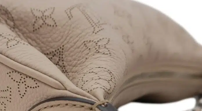 Dove Grey Bags by British brand BAIA dove grey perforated leather handbag craftsmanship detail