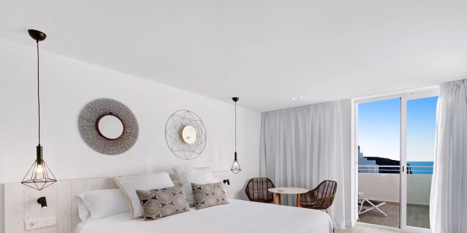 Barcelo Bedroom, Ibiza Bedroom at Ibiza Barcelo Portinatx hotel. Courtesy of the Hotel