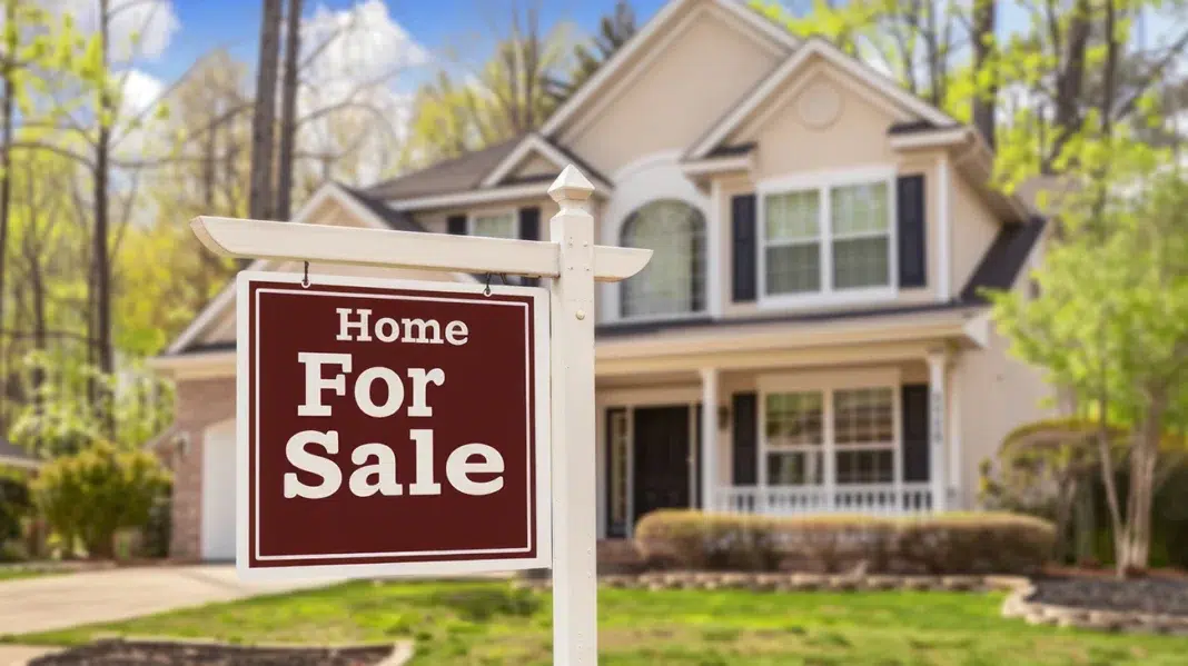 A big sign in front of a home that is selling. Photo via vecteezy A big sign in front of a home that is selling. Photo via vecteezy