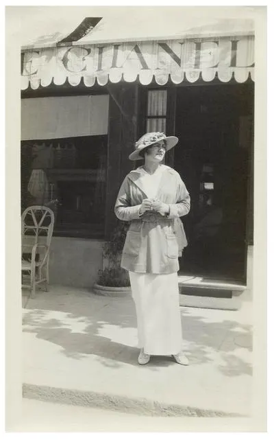 Gabrielle Chanel in front of her boutique in Deauville, 1913 Gabrielle Chanel in front of her boutique in Deauville, 1913
