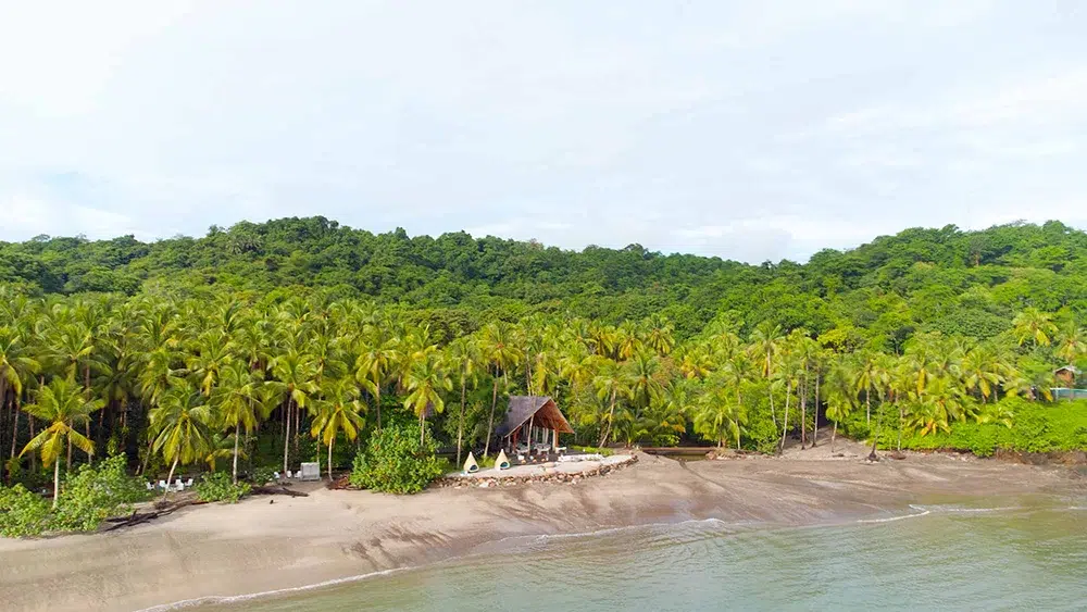 Aerial view of Islas Secas, Panama’s exclusive private island retreat framed by palm-lined shores.