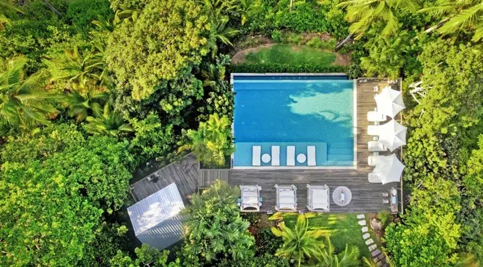 Islas Secas Panama, A Luxury Traveler’s Paradise Aerial view of the private pool at Islas Secas, Panama, surrounded by tropical jungle and pristine natural beauty.