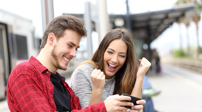 Gameplay Review of Fluffy Favorites Happy couple winning online games together waiting in a train station