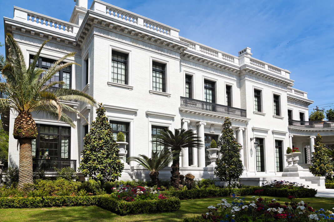home facade improvement with beautiful landscaping. Photo via adobe free stock
