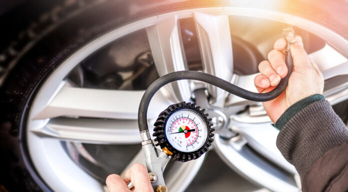 A Guide To Choosing The Right Tire Inflator and Air Compressor Tire compressor. Photo via adobe
