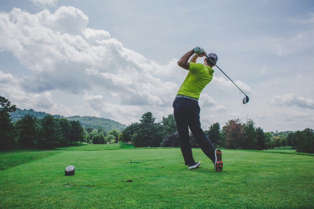 Playing Golf in your own backyard. Photo by Courtney Cook via unsplash