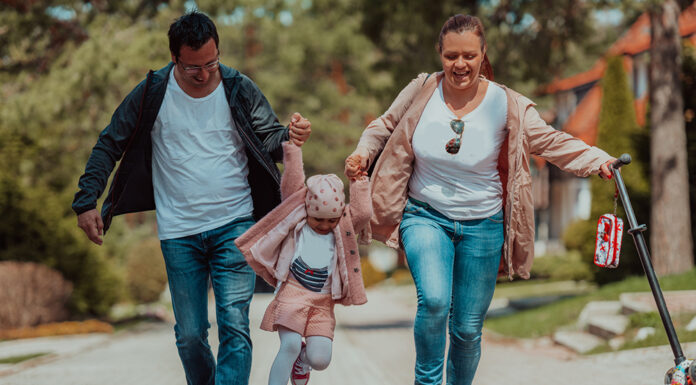 Effective Eco-Friendly Ways You Can Get Around Family fun in the park. Happy family spending time in park and playing with their daughter