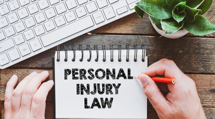 Need a Personal Injury Lawyer? Here’s How to Hire the Right One Personal injury law word written on notepad