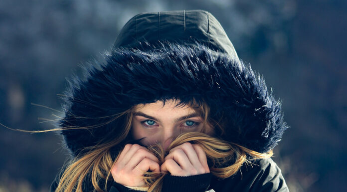 How to look fashionable in your winter wear Woman wearing her Winter Jacket. Photo by Juan Goyache via unsplash