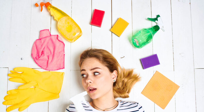 Common Culprits of Bad Odors in Your House woman choosing products to rid of bad odors at home