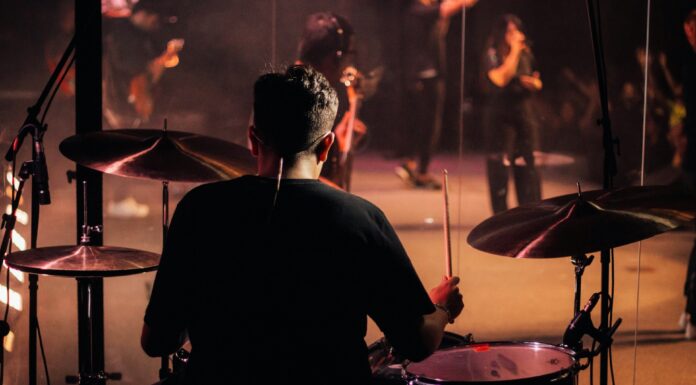 6 Handy Tips That Will Help Maintain Your Drum Kit Playing Drum. Photo by Rafael Oliveira via unsplash