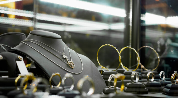 Gold vs. Silver Jewelry: Which is Most Popular? gold and silver jewelry at a store. Photo via adobe stock images