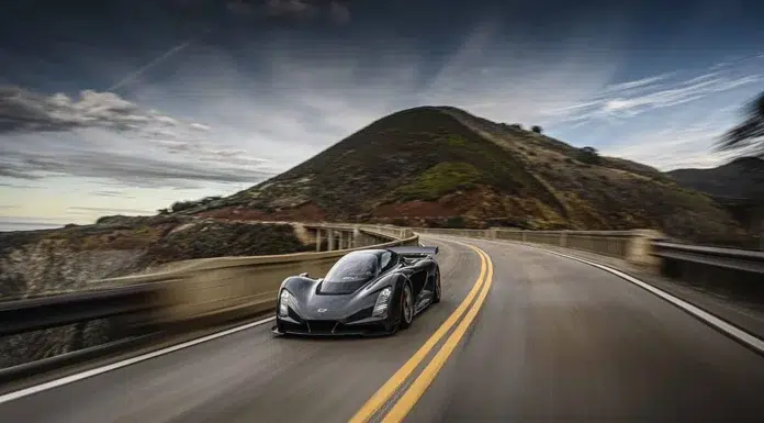 Faster than a Tesla and more exotic than a Bugatti- Meet the Czinger 21C 3D printed hypercar Czinger 21C automobile driving the road at full speed