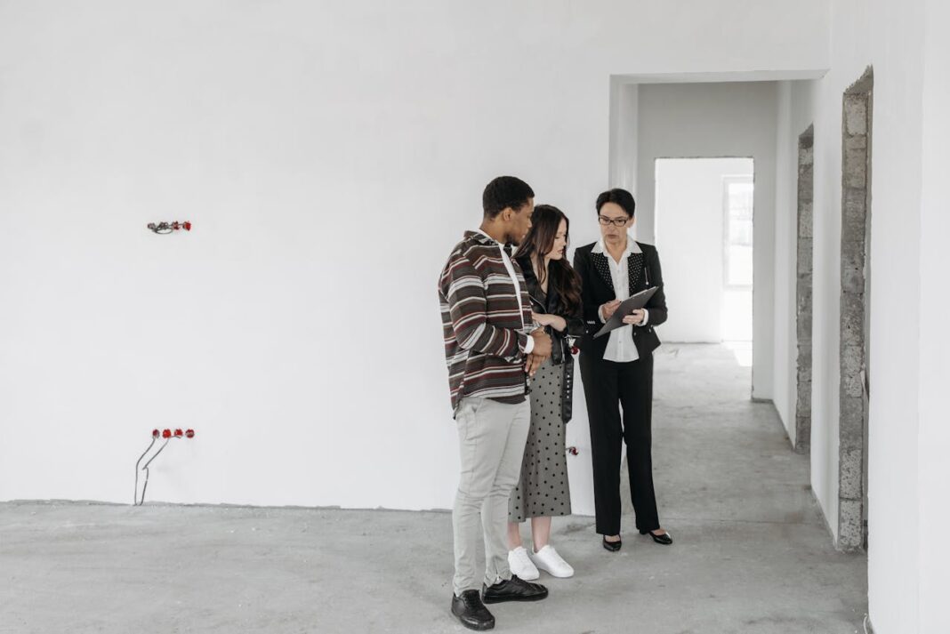 First Time landlord with her clients. Photo via Pexels by pavel danilyuk