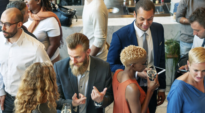 How to Use Events for Business Growth Diverse business people in a dinner party
