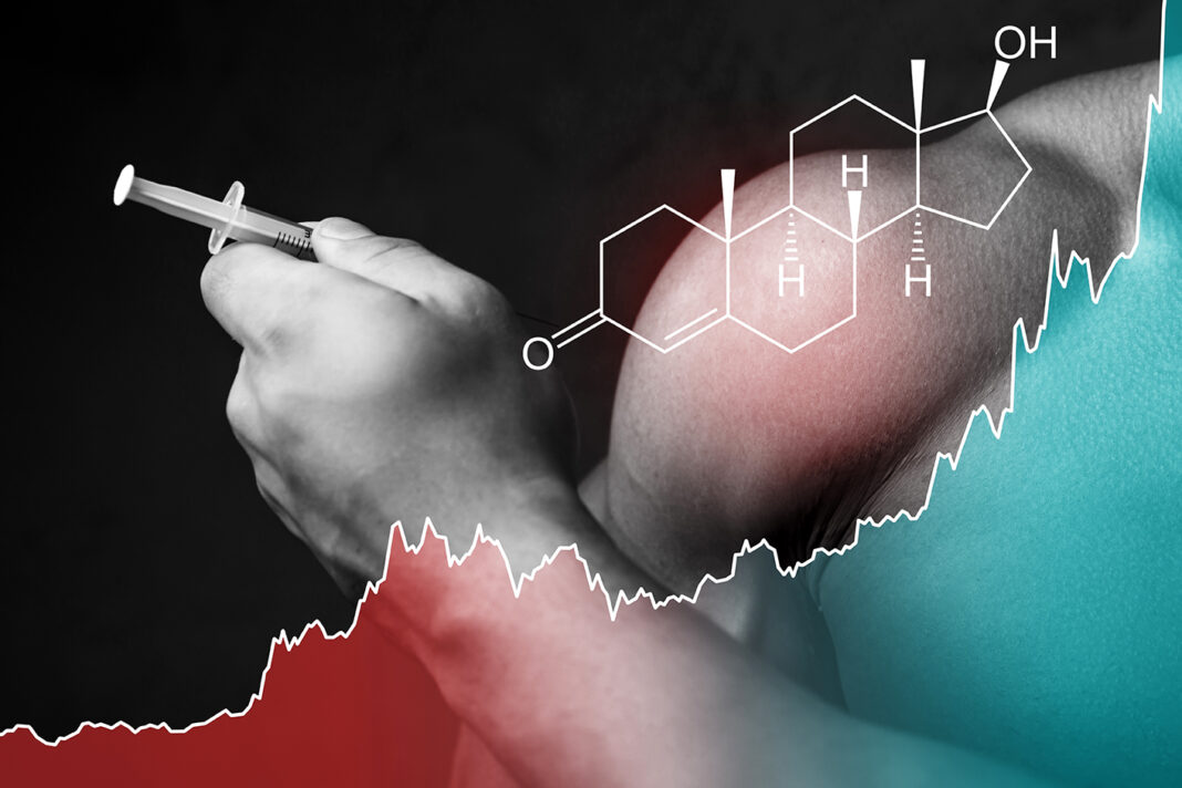 Anabolic steroids usage. Male hand with syringe and testosterone