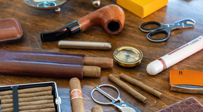 6 Amazing Gift Ideas For Cigar Smokers Smoking tobacco set and accessories on wooden desk