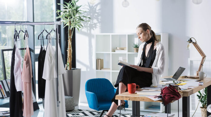 Books That Inspired Fashion Designers fashion designer reading a book that inspires her