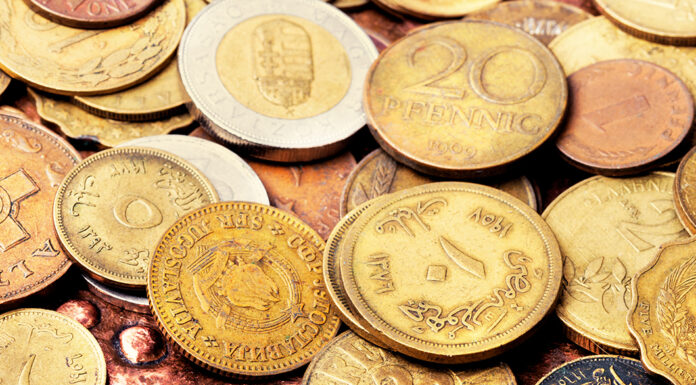 The Case for Investing in Silver and Gold Numismatic Coins Gold and Silver coins. Photo via adobe free stock images