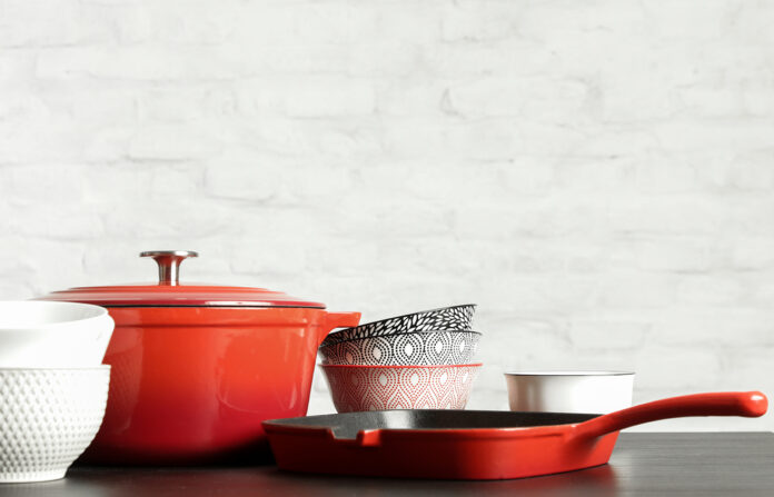 Cookware set: Red enameled cast iron pot, saucepan and bowls