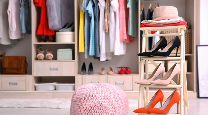 A Guide To Organizing Your Shoe Collection Pink ottoman chair and stand with shoes in dressing room