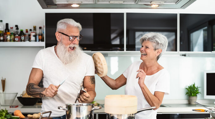 The Role of Nutrition in Healthy Aging: Meal Planning for Seniors Happy seniors having a nutritional meal preparation