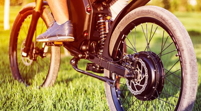 How to Choose the Right Electric Bike for You Man biker sitting on electric bike