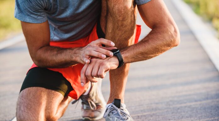 What Is A Sports Watch? Young handsome wearing a sports watch