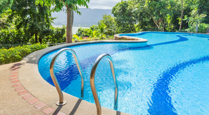 Splish Splash: Quick And Easy Tips For Routine Pool Upkeep Ladder stainless handrails in private luxury infinity pool