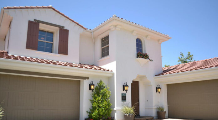 Top 6 Reasons To Hire Roofing Experts Roofing experts build the roof of this house. Photo by Luis Yanez via pexels.com