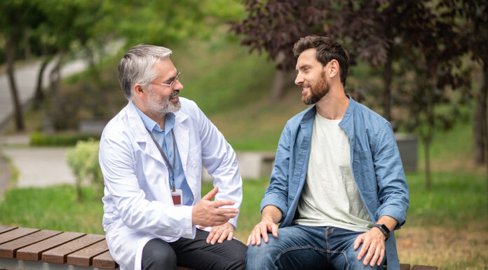 Everything You Need to Know About Suboxone Treatment Male patient talking to his doctor and telling about symptoms