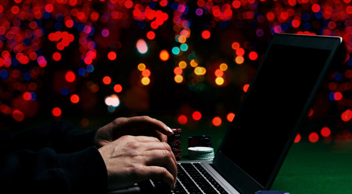 The Ultimate Guide on How to Play Online Poker: Everything Beginners Need to Know Playing online poker. Photo via Adobe Stock Free Images