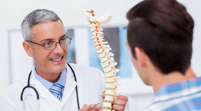 6 Lifestyle Factors Influencing Your Spine Health Spine Center in Fremont Doctor explaining. Image source Pixabay