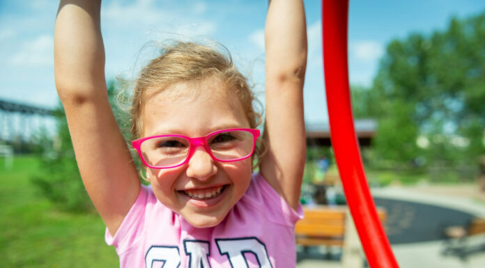 How to Help Your Kids Choose the Right Glasses Child wearing her glasses. Photo by Michal VRBA via unsplash