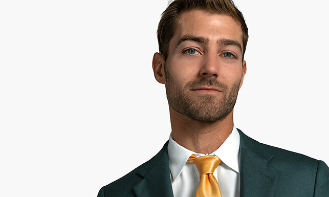 In the Emerald Spotlight: Green-Colored Suits Take Center Stage in Fashion Hunter Green Suit