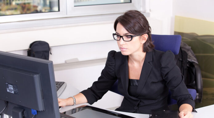 Tips for Launching a Successful Beauty Business Beauty business owner doing research. Photo by Claudio Scott via pixabay