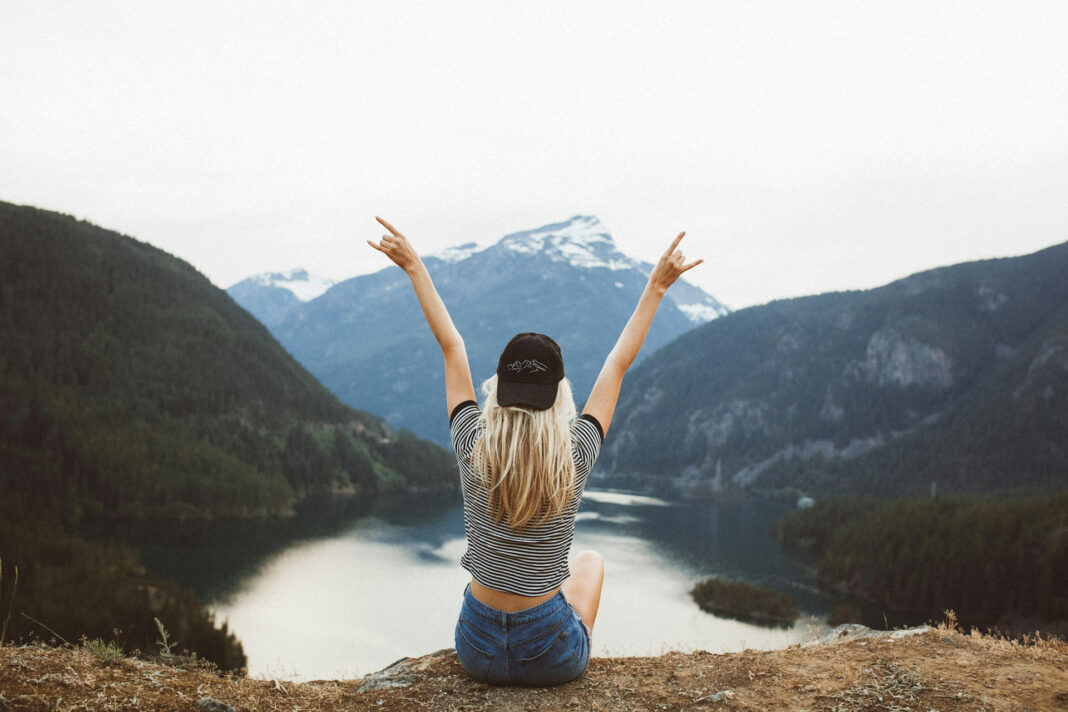 Happy Woman after Psychotherapy Treatment for addition. Photo by Becca Tapert via unsplash
