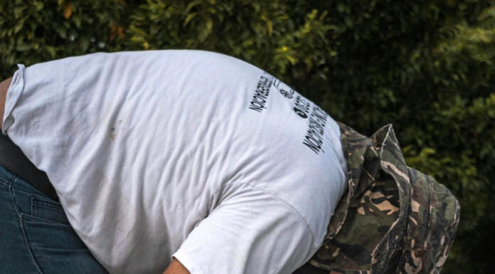 Warmth and Comfort: Essential Tips for Efficient Home Heating Men working on air conditioner. Photo via pexels