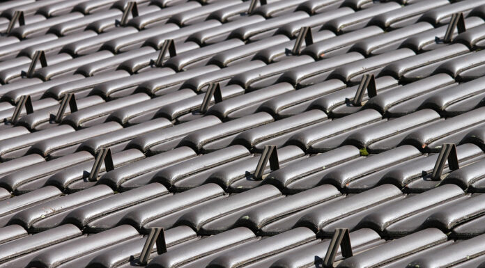 Top-Tier Transformation: 6 Top Tips for Achieving the Ultimate Roof Makeover Roof Tiles. Photo by Manfred Richter from Pixabay