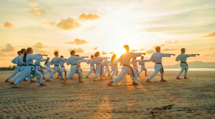 5 Essential Benefits of Learning Martial Arts A group of people learning Martial Arts. Photo by Thao Lee via unsplash