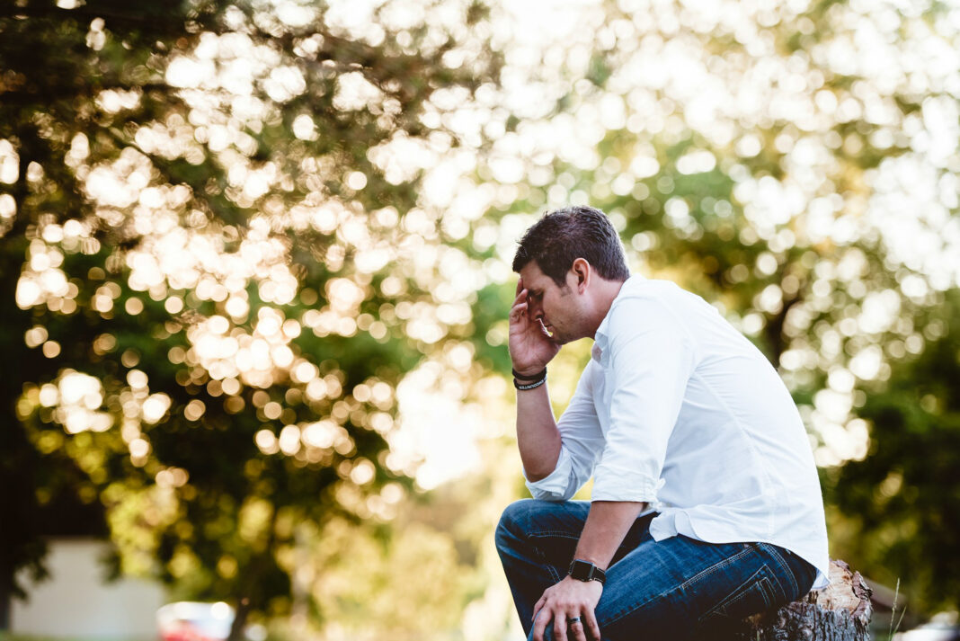 A man feeling guilt & shame. Photo by Ben White via unsplash
