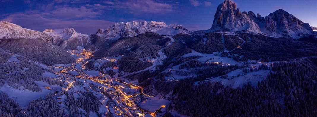 Beautiful panoramic view of Dolomites mountains at dusk during w