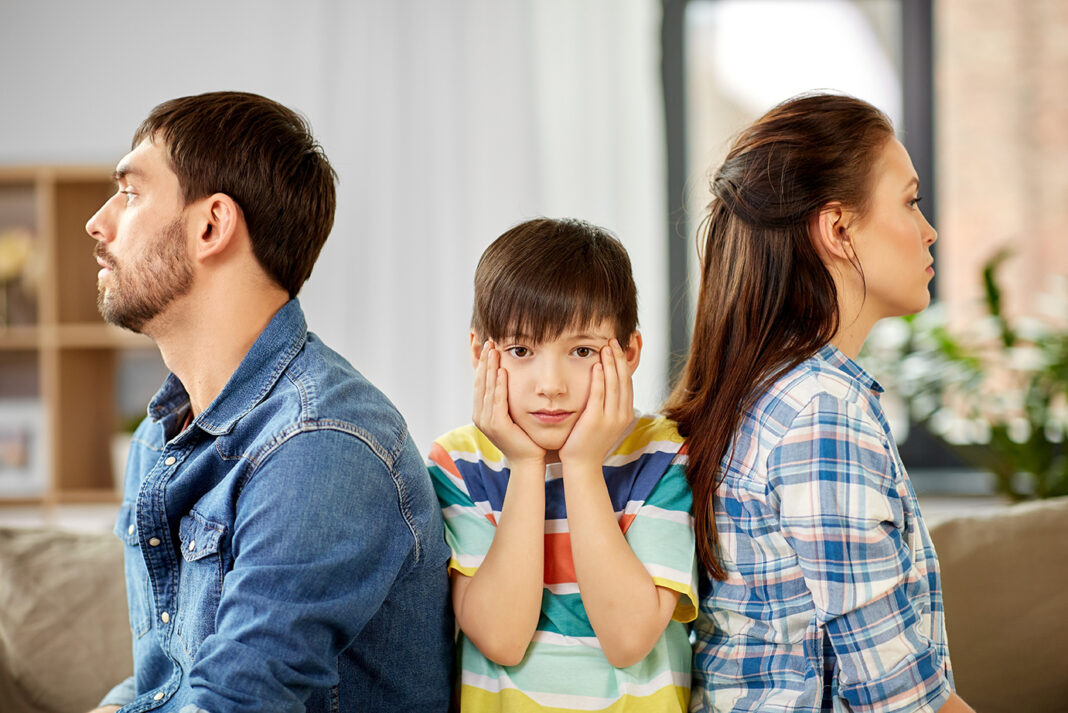 A couple getting a divorce with a child. Photo by adobe free stock images