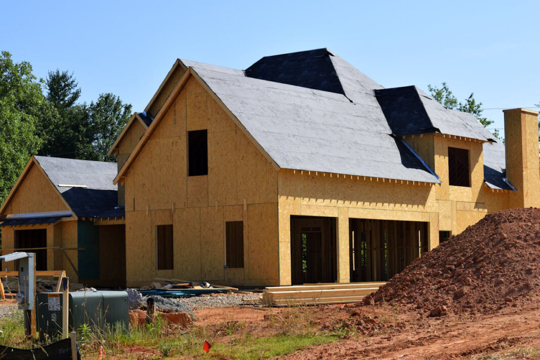 House with a new roof. Photo by Pixabay via pexels
