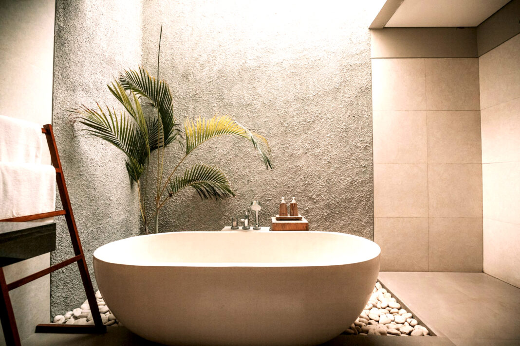 Beautifully decorated modern bathroom. Photo by Jared Rice via unsplash Beautifully decorated modern bathroom. Photo by Jared Rice via unsplash