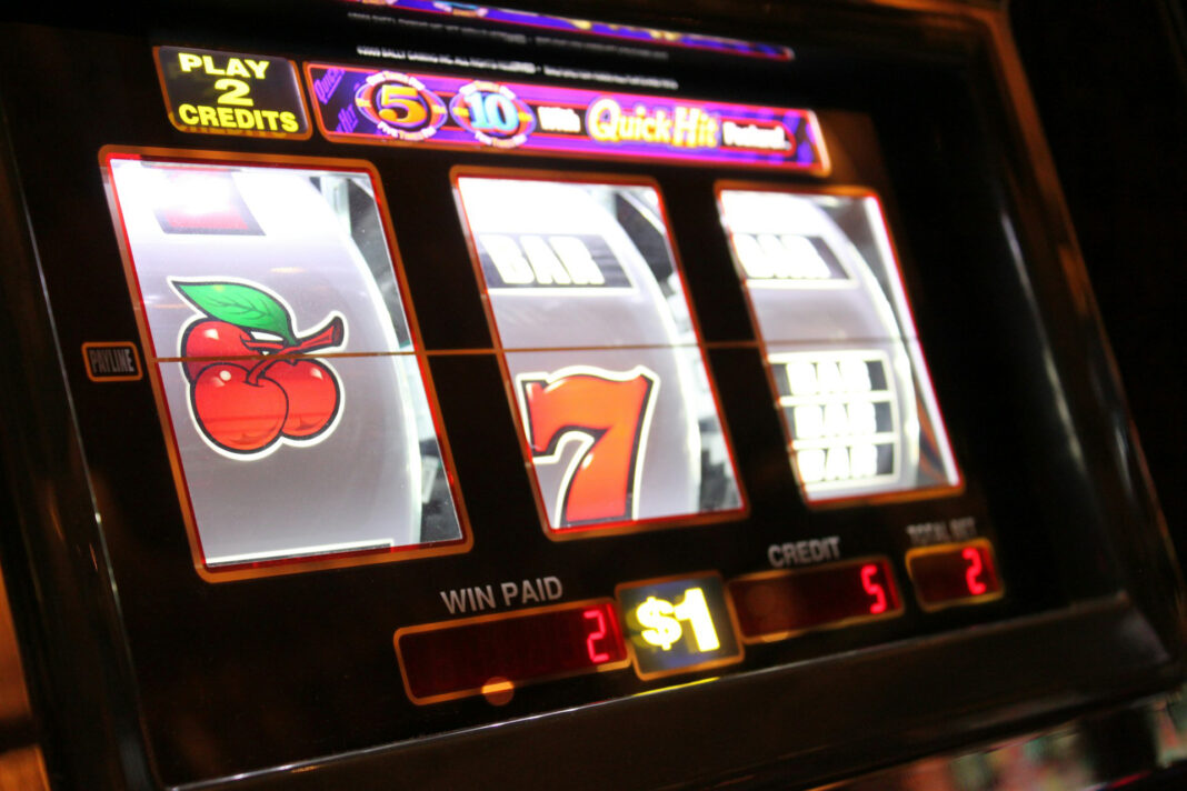 Embracing slot online gaming. Photo by Ays Be via unsplash