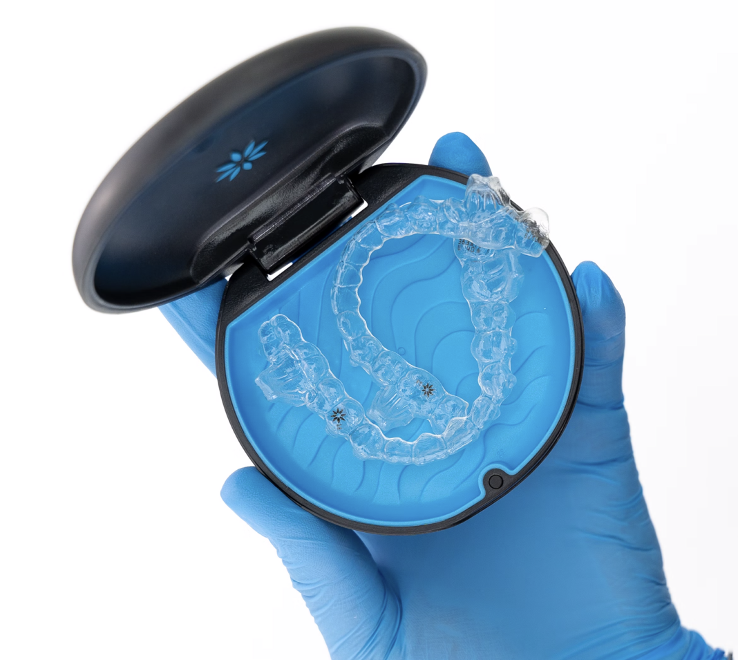 Invisalign, clear orthodontic device. Photo by Katarzyna Zygnerska via unsplash