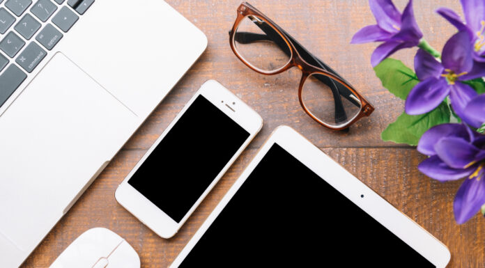 Elevating Lifestyle With Tech: Apple Edition Office desk composition with technological device. Photo via freepik