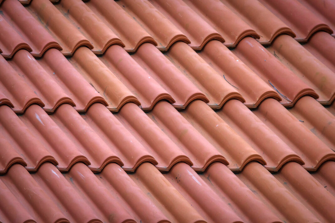Quality Roofing on a house is imperative. Photo by Rocco Stoppoloni via unsplash
